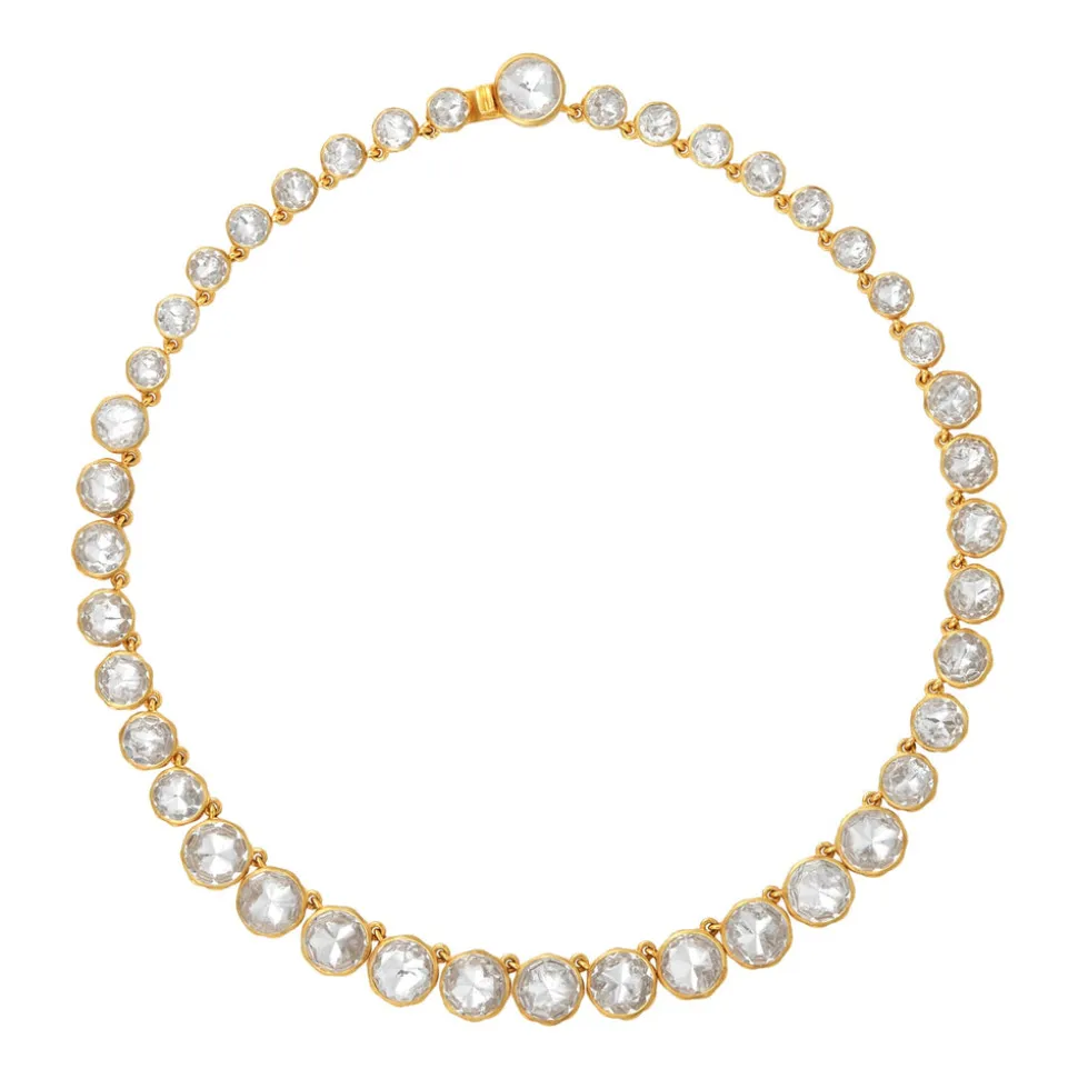 Catherine Round Rivière in White