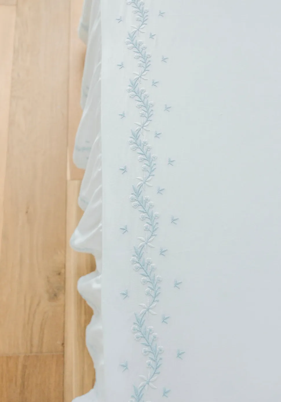 Embroidered Crib Sheet in Sky