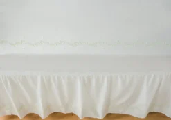 Embroidered Crib Sheet in Meadow